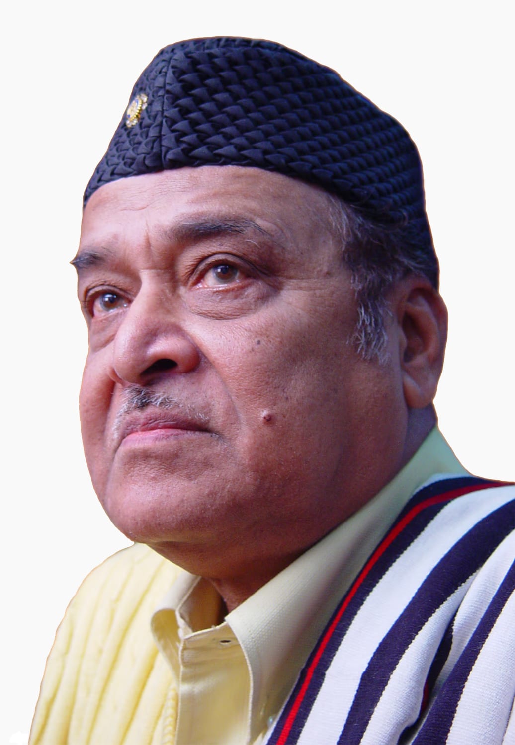 Portrait of Bhupen Hazarika wearing his characteristic dark woven cap